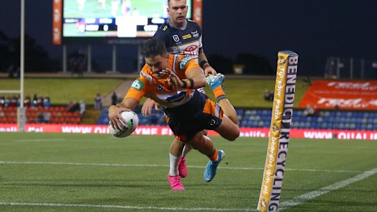 Enari Tuala scores for Newcastle.