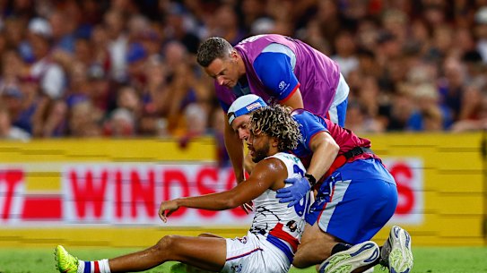 Taken off: Arthur Jones was removed from the game after a high hit from Harris Andrews.