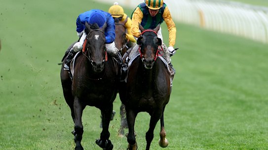 Chad Schofield on Ceolwulf (right) won by the narrowest margin in the Champions Mile.