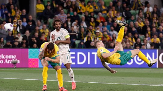 Riley McGree of the Socceroos attempts a overhead kick.