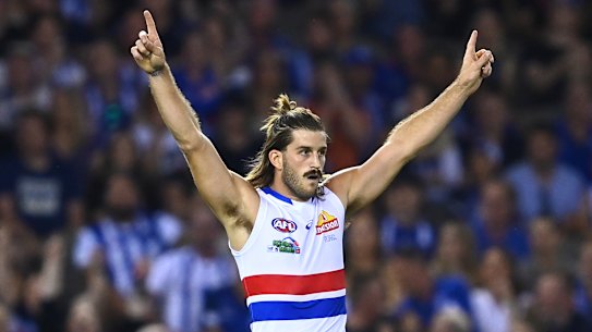 MELBOURNE, AUSTRALIA - APRIL 02: Josh Bruce of the Bulldogs celebrates kicking a goal during the round 3 AFL match between the North Melbourne Kangaroos and the Western Bulldogs at Marvel Stadium on April 02, 2021 in Melbourne, Australia. (Photo by Quinn Rooney/Getty Images) MELBOURNE, AUSTRALIA - APRIL 02: Josh Bruce of the Bulldogs celebrates kicking a goal during the round 3 AFL match between the North Melbourne Kangaroos and the Western Bulldogs at Marvel Stadium on April 02, 2021 in Melbourne, Australia. (Photo by Quinn Rooney/Getty Images)