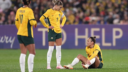 Caitlin Foord reacts after an injury during the international friendly match between the Matildas and China.
