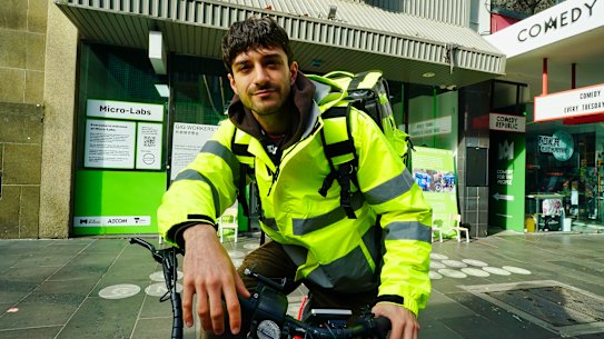 Monash PhD student Andrew Copolov outside the Gig Workers Hub on Bourke Street.