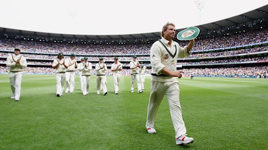 MELBOURNE, AUSTRALIA - DECEMBER 26:  Shane Warne of Australia leaves the field after taking his 700th test wicket during day one of the fourth Ashes Test Match between Australia and England at the Melbourne Cricket Ground on December 26, 2006 