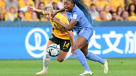 Kadidiatou Diani of France and Alanna Kennedy of Australia compete for the ball.