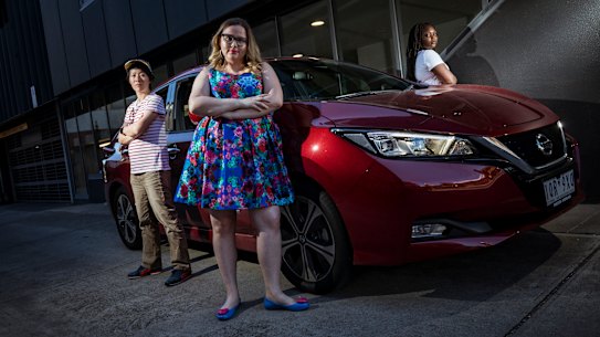Sarah Moran from Girl Geek Academy (centre) with her 'Girl Gang' Riham Koko, Marie Ng and Leura Smith and their Nissan Leaf electric vehicle. 