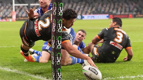 David Nofoaluma scores in the Tigers big win.