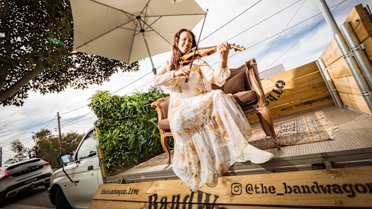 Fem Belling on the Band Wagon.