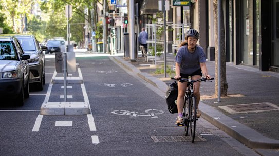 A cyclist on a bike lane in Exhibition Street, Melbourne.