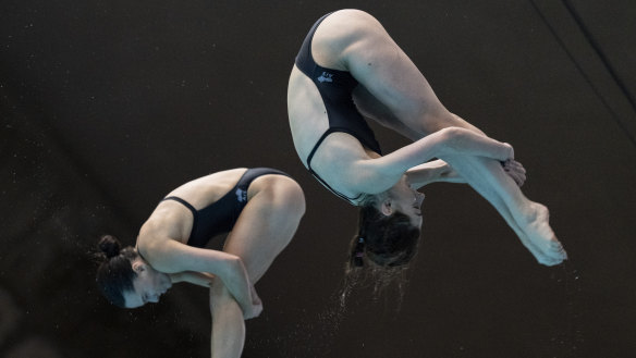 Maddison Keeney and Anabelle Smith of Australia compete during the women’s 3m synchronized springboard final at the World Aquatics Diving World Cup 2024 in Montreal, Québec, Sunday, March 3, 2024. (Christinne Muschi/The Canadian Press via AP)