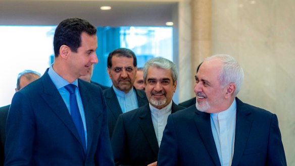 Syrian President Bashar al-Assad, left, speaking with Iranian Foreign Minister Mohammad Javad Zarif, right, in Damascus, Syria, last month.