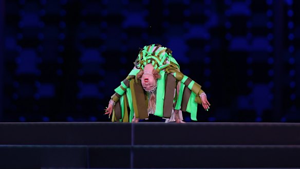 An entertainer performs during the closing ceremony.
