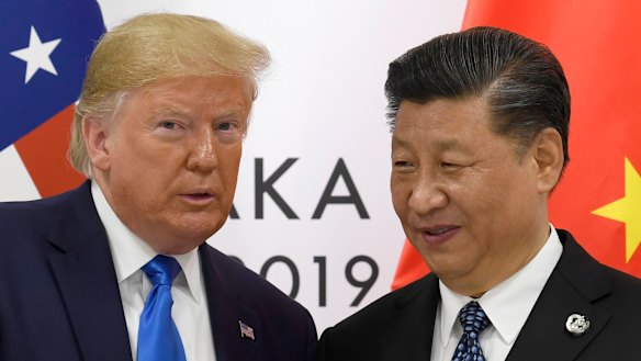 US President Donald Trump poses for a photo with Chinese President Xi Jinping.