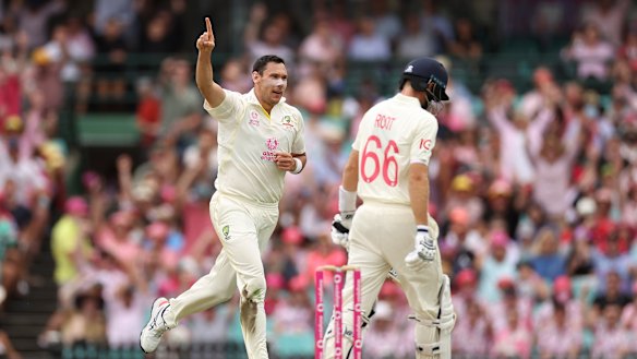Scott Boland celebrates the wicket of Joe Root. 