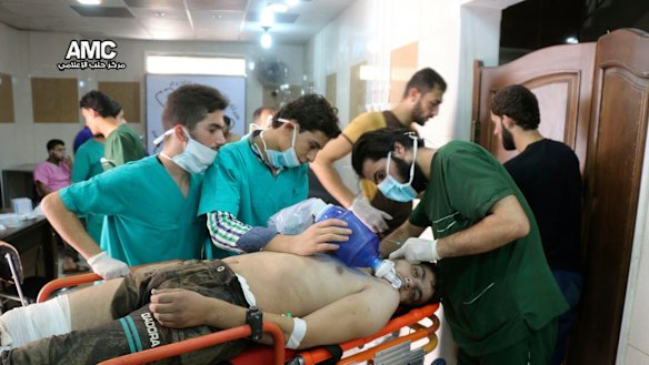 A man is treated by Syrian medical staff after a chemical weapons attack in 2016.