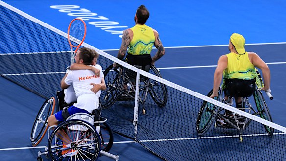 Dutch team Sam Schroder and Niels Vink celebrate winning tennis gold against Dylan Alcott and Heath Davidson in the men’s quad doubles.