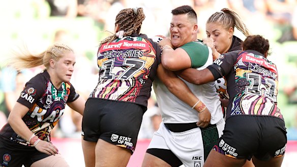 Big run: Kerehitina Matua  leads the charge for the Maori side.