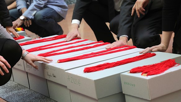 Invited guests participate in a ceremony to return the mortal remains of Indigenous Australians from the State Ethnographic collections at Martin Luther University in Germany.