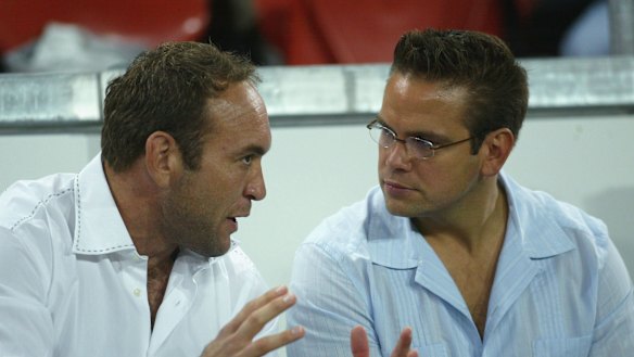 Gorden Tallis and Lachlan Murdoch locked in discussion in 2004.