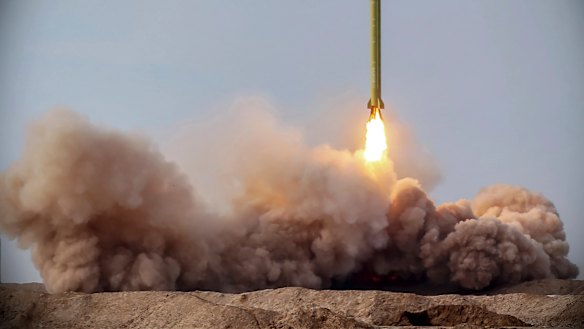 A ballistic missile is launched in a drill in Iran. 