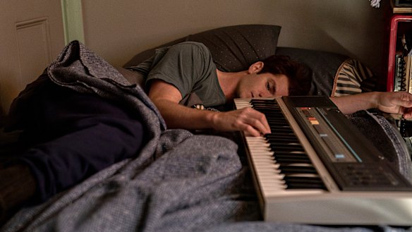 Andrew Garfield plays the obsessive playwright and composer Jonathan Larson in tick, tick...Boom!