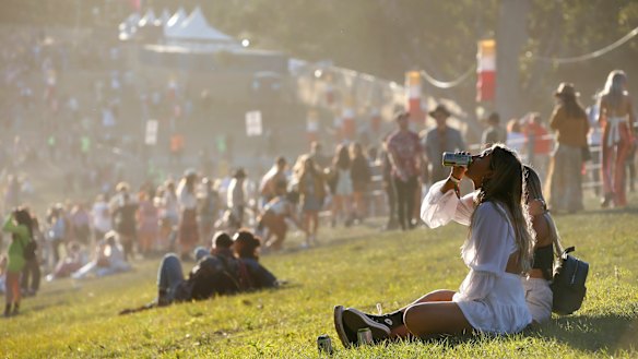 Festivalgoers watch the sun set at Splendour In the Grass.