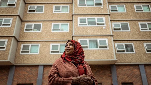 Resident Awatif Taha outside one of the Racecourse Road, Flemington, towers.