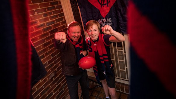 Diehard Melbourne Demons supporters Stephen and James Le Get can’t wait for their team to play in the grand final. 