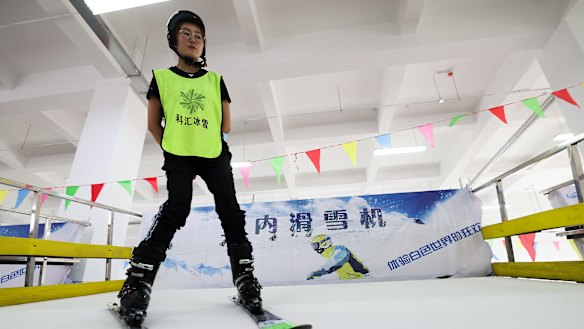 Workers test the ski simulator at the Zhangjiakou Ice and Snow Sports Equipment Park in Zhangjiakou, China. 