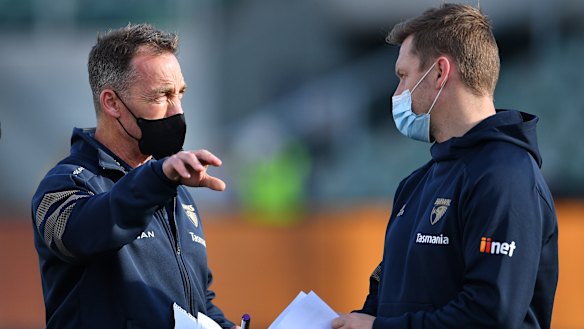 Alastair Clarkson and Sam Mitchell during the Hawks’ clash with the Lions.