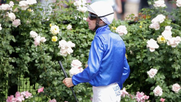 Out of the running: Hugh Bowman at Flemington Racecourse on Saturday.