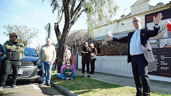 Auctioneer Tom Alexiadis at the auction for 59 Gooch Street, Thornbury on Saturday.