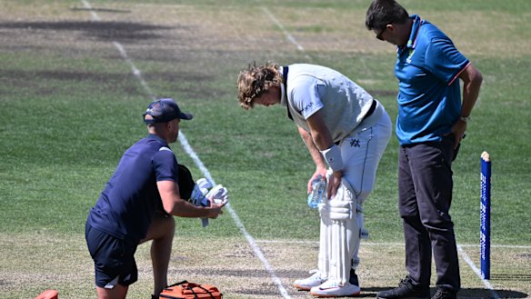 Will Pucovski after he was struck by a ball from Riley Meredith on Sunday.