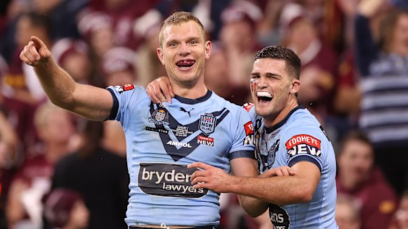 Tom Trbojevic and Nathan Cleary celebrate a try in Origin I.