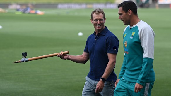 Australia’s chairman of selectors George Bailey chats with paceman Scott Boland during an Ashes training session at Blundstone Arena. 