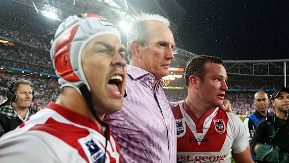 Jamie Soward with former coach Wayne Bennett and teammate Dean Young after the 2010 grand final victory against the Roosters.