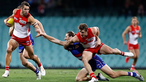 Josh Kennedy (left) and Marcus Bontempelli (centre) were two of the more central figures in Thursday night's clash.