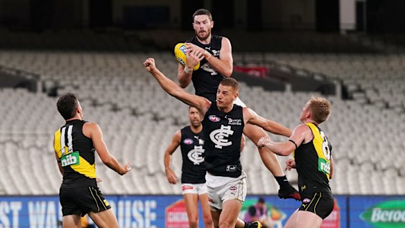 Mark of a champion: Carlton's Mitch McGovern rises high to take a grab.