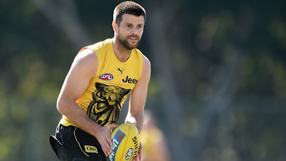 Toil and trouble: Trent Cotchin in training with the Tigers at the Gold Coast hub.