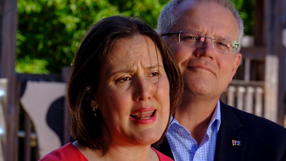 Kelly O'Dwyer announces her decision to quit politics alongside a supportive Scott Morrison.