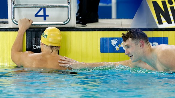 Isaac Cooper is consoled by Ryan Murphy of the United States after the re-swim of the men’s 50m backstroke final.