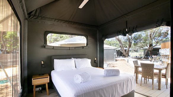 Each glamping tent comes standard with spacious ensuites, fans and private outdoor decks plus access to a range of handy services to enhance your stay at the eco-resort.