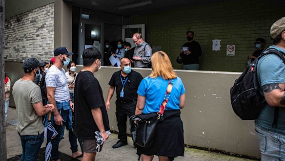 A moment of tension on the Laverty pop-up clinic on Crown Street, Surry Hills, when those in the queue were told that no more testing would be performed.