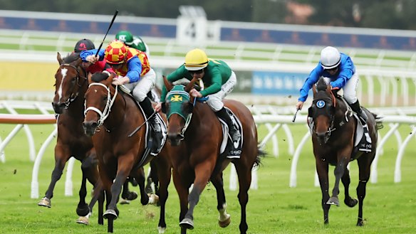 Sheza Alibi, centre, runs away from Autumn Boy, left, in the Randwick Guineas.