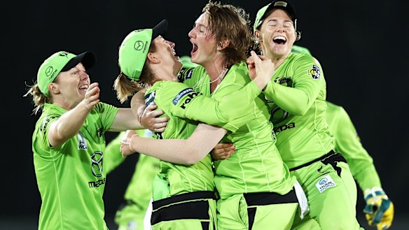 Thunder players celebrate their semi-final victory.