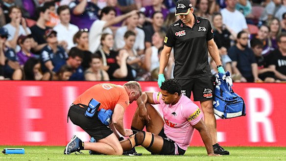 Tevita Pangai jnr gets attention for his injured knee last week.
