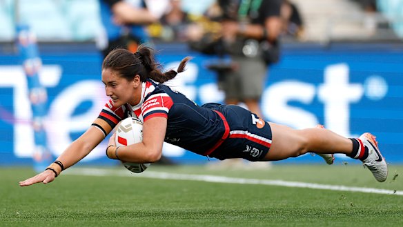 Dally M winner Olivia Kernick scores for the Roosters.