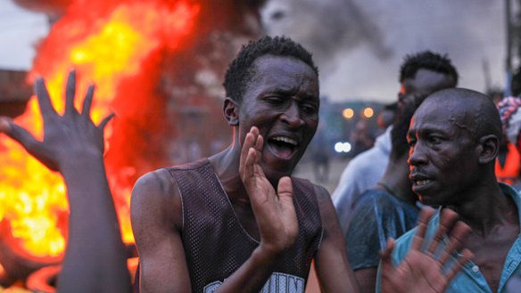 Opposition supporters protest the deputy president’s candidacy last week.