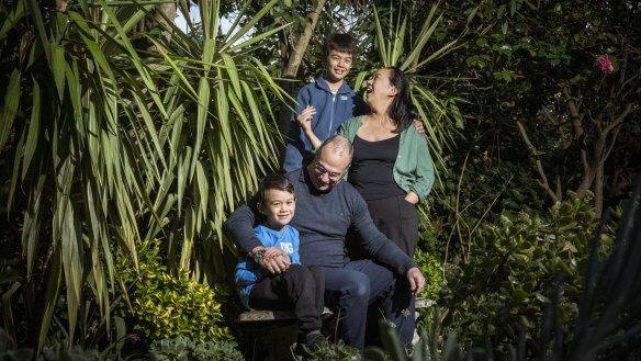 The Dorin family - Gordon, Archie, Saul 9 and Joshua, 6 - in their Kew front yard.