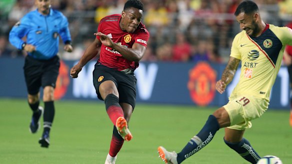 Early exit: Anthony Martial in action against Club America.